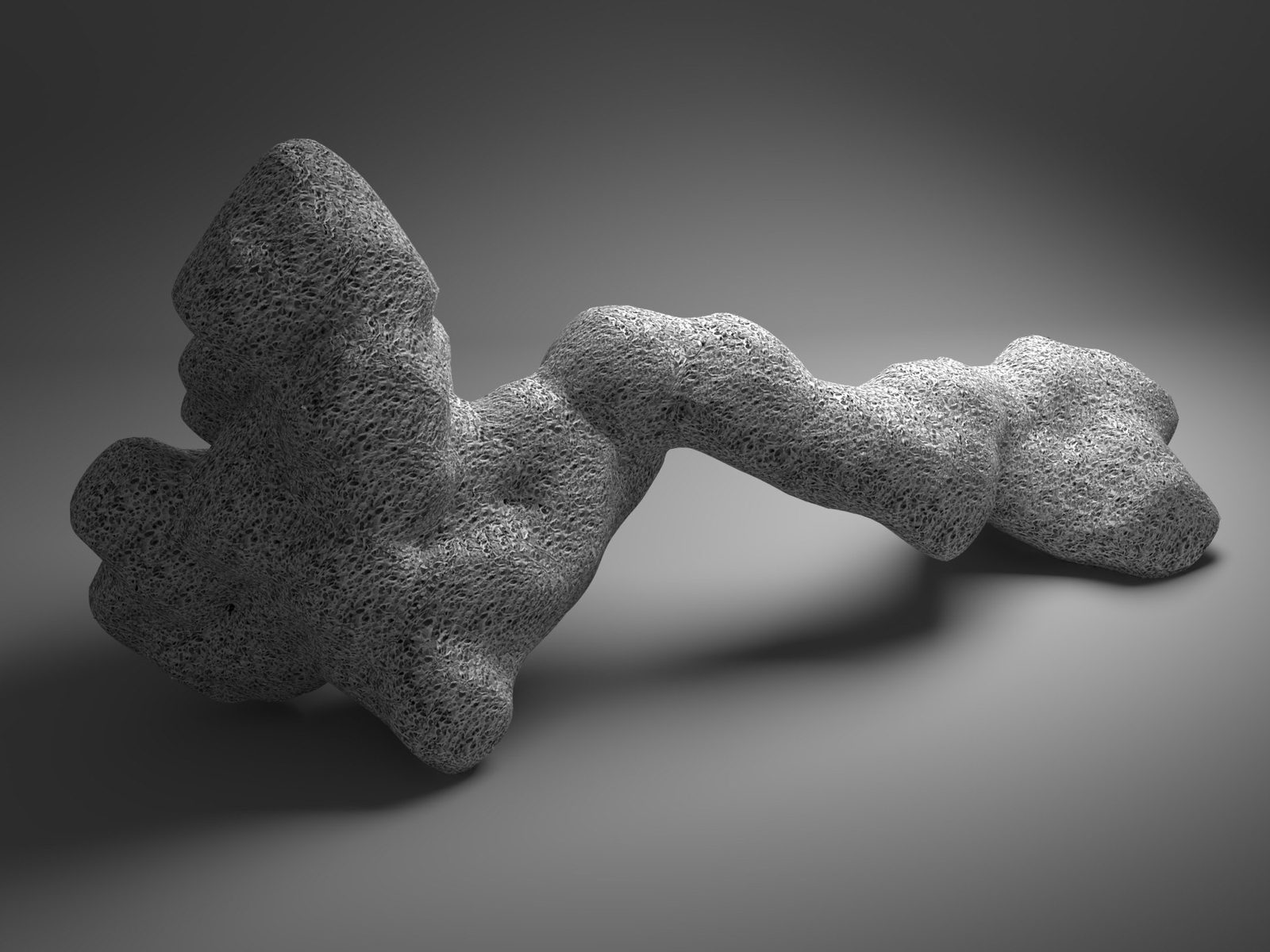 A dense reclining accretion, its surface finely granular
