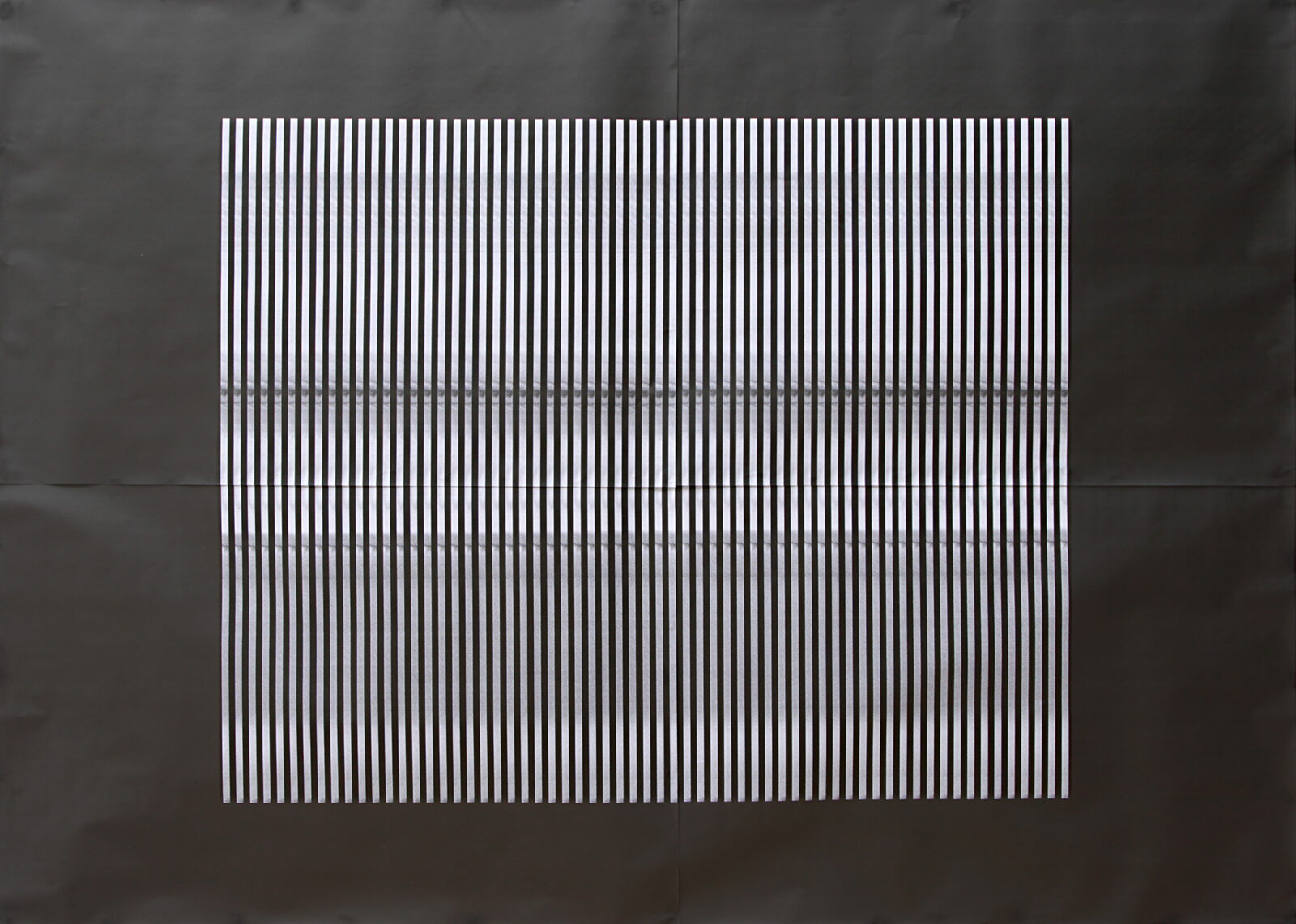 The print seen flat against a grey ground, its bands of strokes filling the sheet