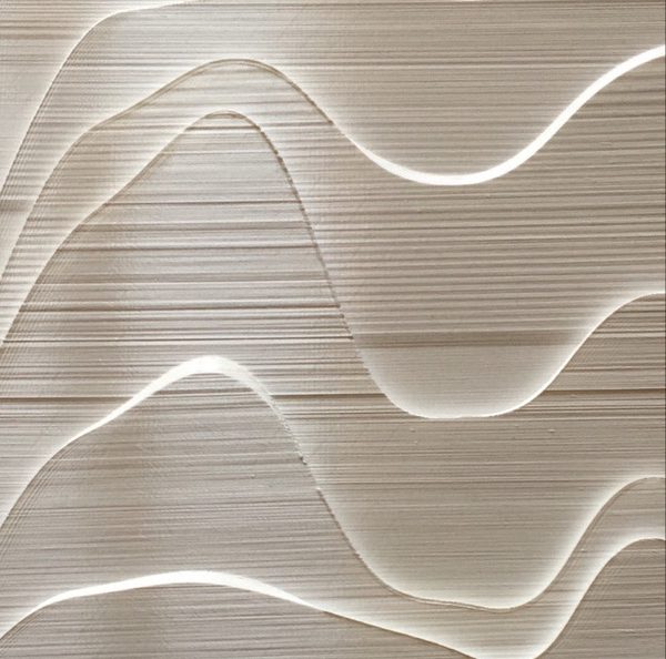 Macro of the printed surface, the horizontal layer lines running under the wave of the slice edges